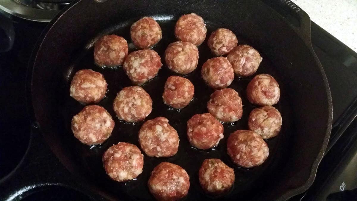 sausage balls in cast iron frying pan