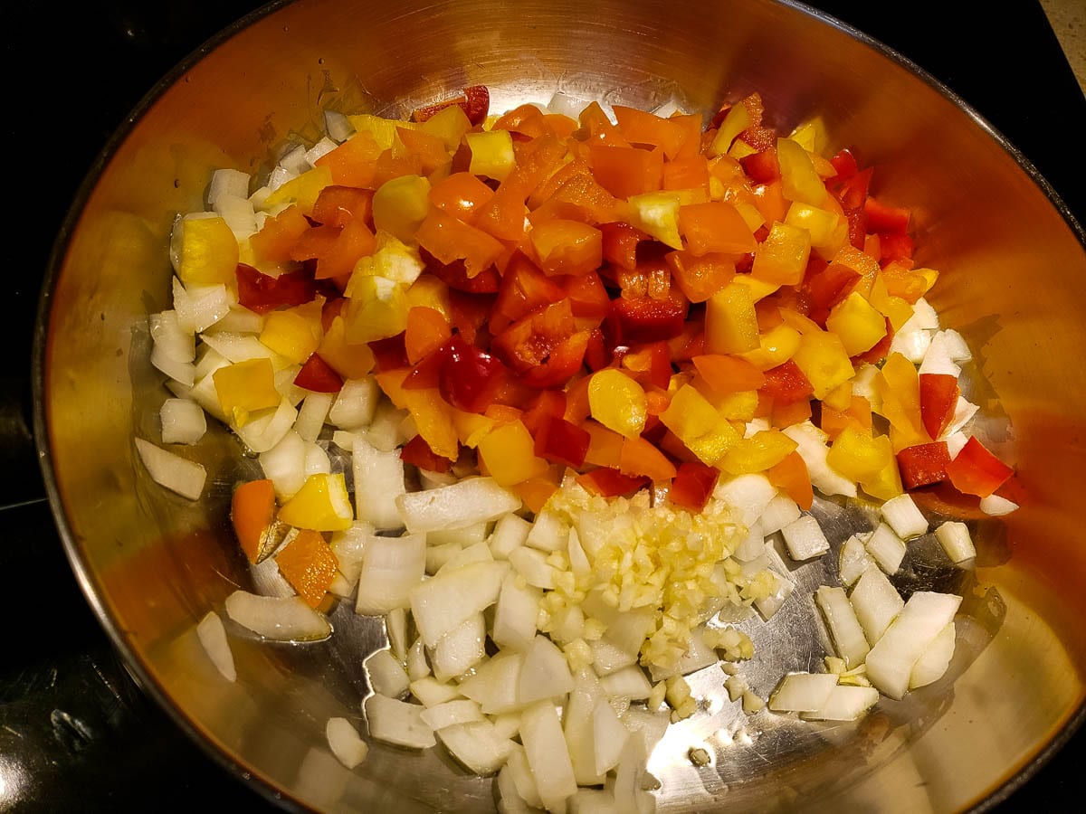 chopped [e[[ers, onions, and garlic in a skillet