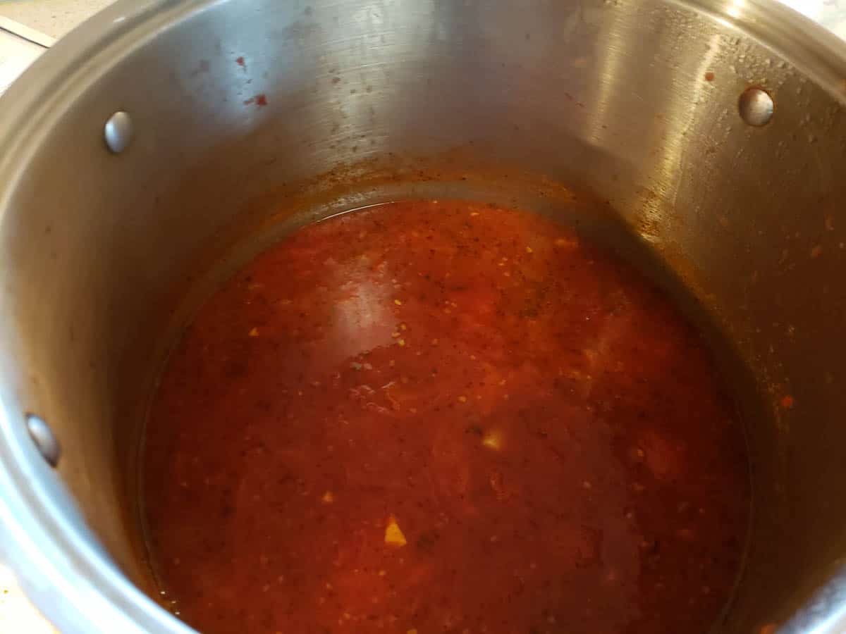pureed ingredients for marinara sauce in large stockpot