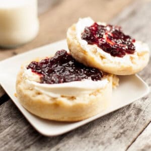 English muffin with cream cheese and jam