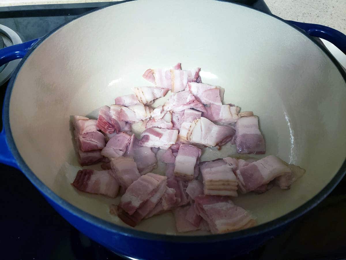 chopped bacon in dutch oven.