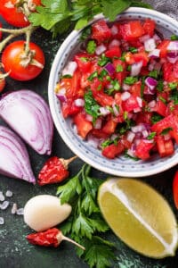 ingredients for salsa on table.