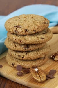 Peppermint Carob Chip Cookies stacked on wooden cutting board