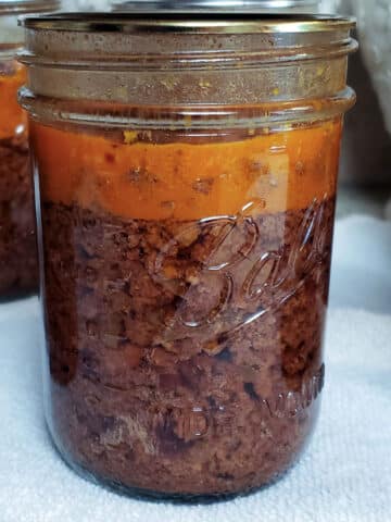 Pint jar of pressure canned taco meat.