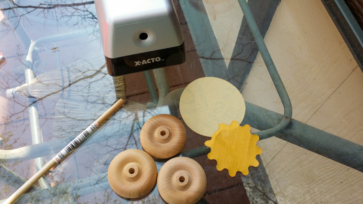 Supplies to make a drop spindle.